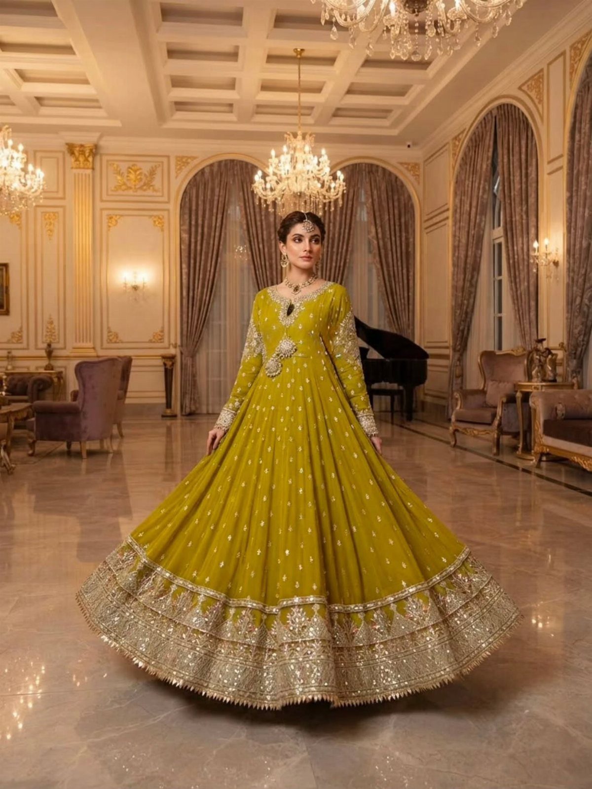 Woman in a lime green embroidered maxi gown standing in a luxury ballroom