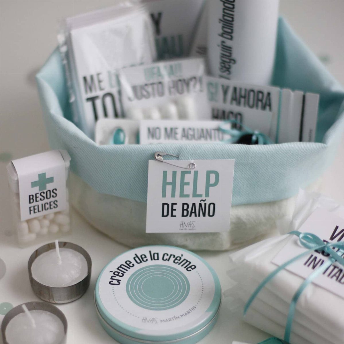 Light blue fabric bathroom basket filled with wedding guest toiletries and care items.