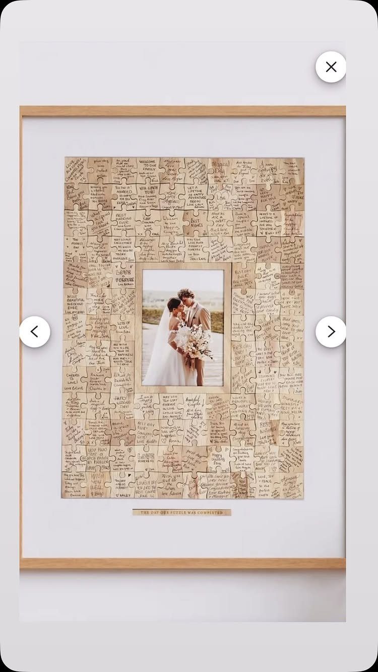 Puzzle wedding guest book with handwritten notes surrounding a central couple's photograph.