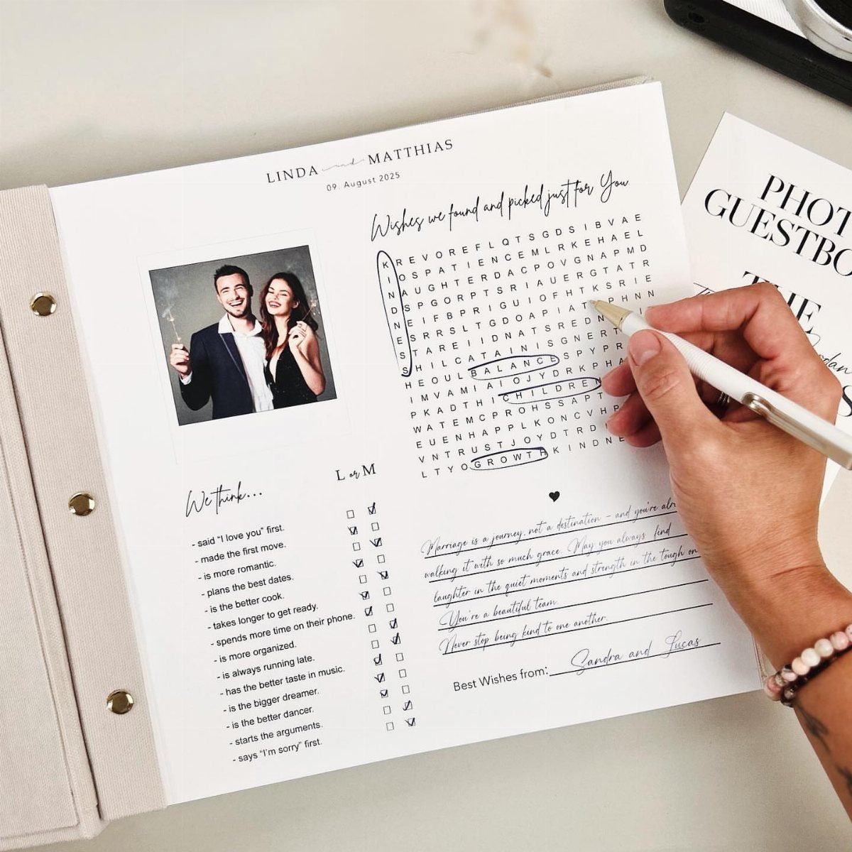 Hand circling letters in a word search puzzle inside a wedding guest book.